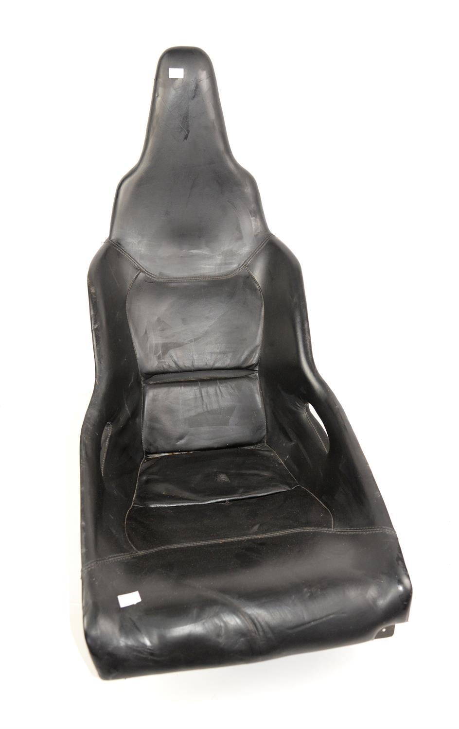 McLaren carbon fibre, leather trimmed road car seat. This carbon fibre leather trimmed car seat