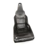 McLaren carbon fibre, leather trimmed road car seat. This carbon fibre leather trimmed car seat