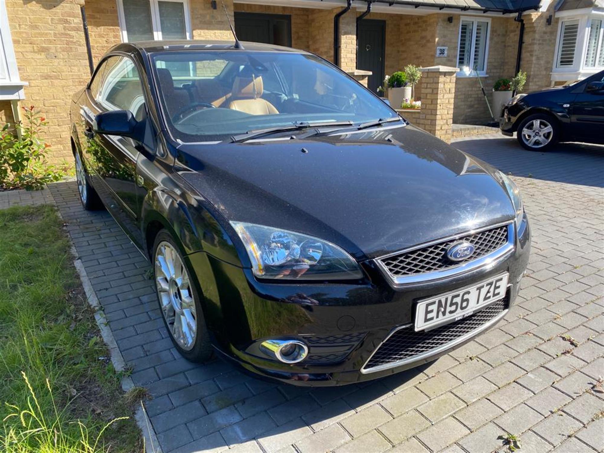 Ford Focus cc3.  2.0L injection convertible, with Pinin Forina leather interior. With eleven