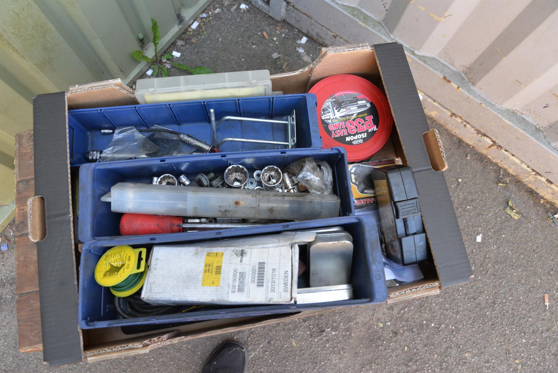 Several boxes of sockets, drill bits and other tools.