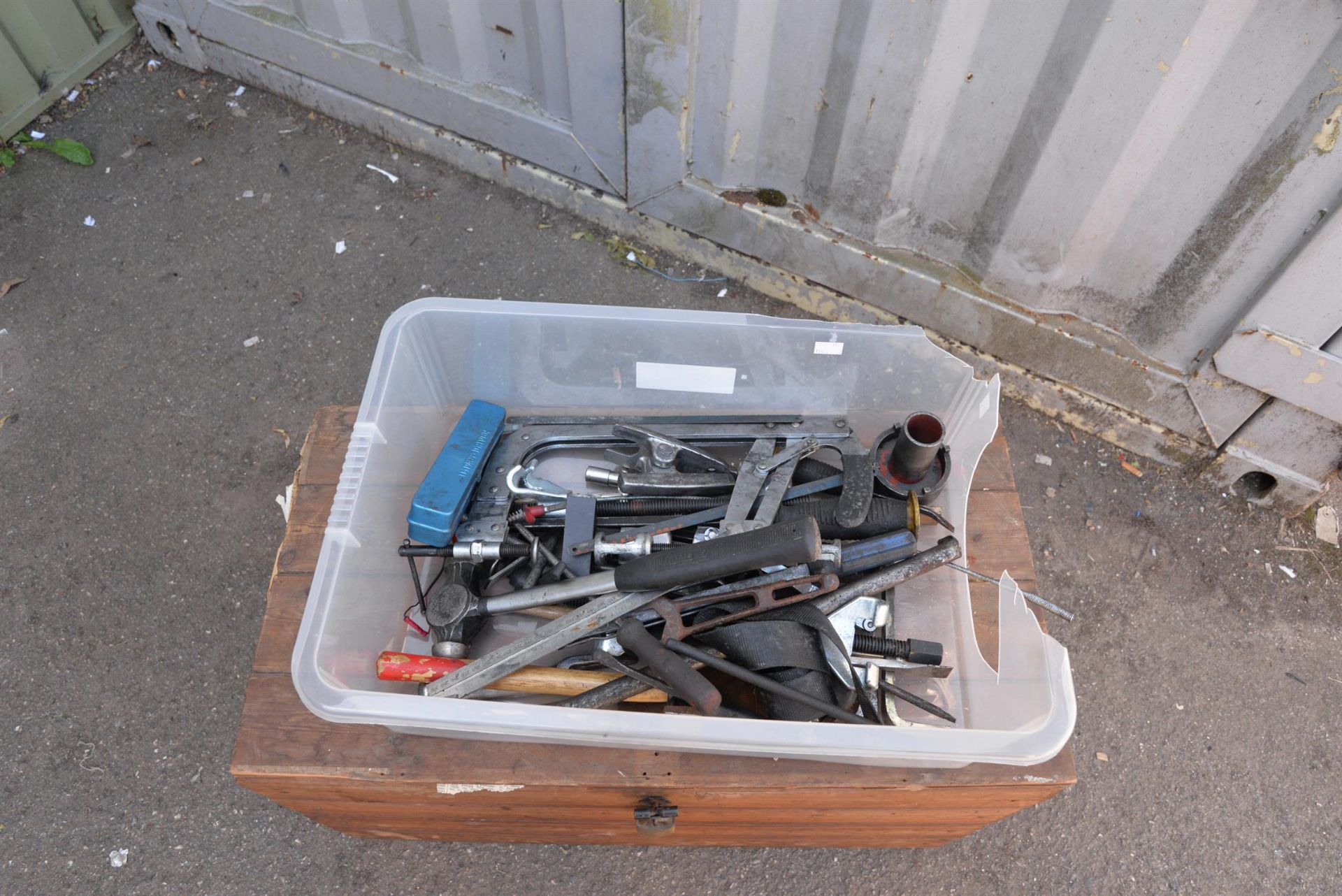 An assortment of tools, to include Stanley lump hammer, impact driver and 1 big metal clamp.