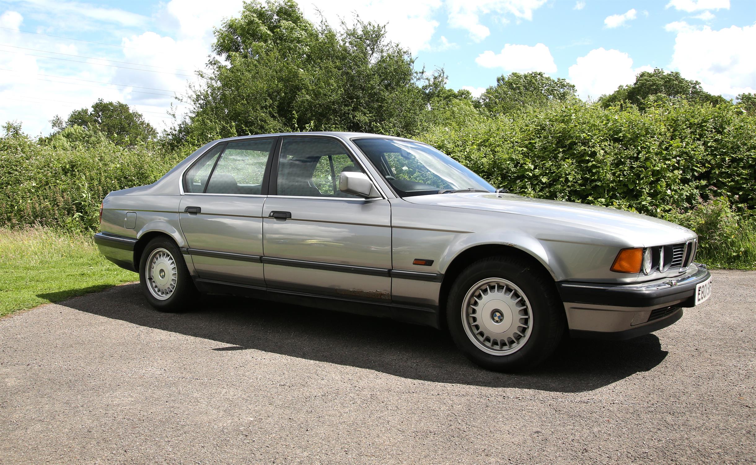 BMW 730i Automatic. Registration number E801 SKE. 140,000 miles. Finished in metallic grey with