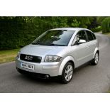 2001 Audi A2 1.4 SE 5-door hatchback Silver coachwork with red leather upholstery.
