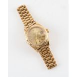 Rolex, a ladies Oyster Perpetual Datejust, the brushed gold tone dial set with baton hour markers