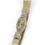 Art deco diamond cocktail watch, oblong dial with Arabic numerals, surround of single cut diamonds,