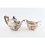 Victorian silver matching teapot and sugar bowl with half-gadrooned bodies, by Roberts & Belk,