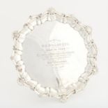 Presentation silver salver by Robert Pringle & Sons with shell and scroll border on claw and ball