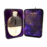 Victorian silver and leather covered oval hip flask, with monogrammed cup, and fitted leather case,