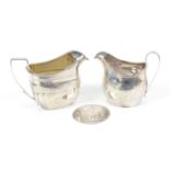 George III silver cream jug, London 1790 and another London 1807 total weight 9oz 282.
