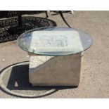 Marble tiled garden coffee table, the bevelled glass circular top on a cubed base,