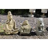 Two reconstituted stone Buddhist figures, another of a Foo Dog and a garden light (4)