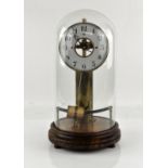 Bulle Electric mantel clock, with magnetic pendulum, 14cm dial and glass dome on an oak base with