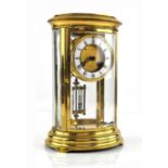 Oval brass four glass mantle clock, the two train movement striking on a bell, mercury compensating