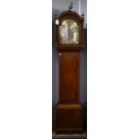 George III oak cased eight day longcase clock, the arched hood with brass finials over a brass dial