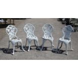 Set of four cast iron garden seats, with floral decorated backs and seats (4)