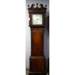 19th century eight day mahogany longcase clock, the swan neck pediment over a floral painted dial