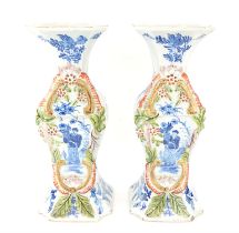 Pair of continental faience vases with under glazed blue and polychrome decoration H29cm