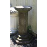 Bird bath, the octagonal top over a cylindrical stem and stepped base, 87 cm high