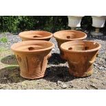 Pair of terracotta garden urns with fruit decoration, 36 cm high, 46 cm diameter,