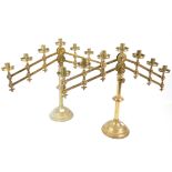 Pair of brass adjustable altar candlesticks, each with seven lights, on circular bases, H48