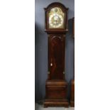 George III mahogany eight day longcase clock, the arched hood, with fluted supports enclosing a