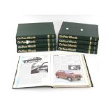 Large quantity of bound copies of 'On Four Wheels' (vintage motoring magazine)