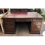 Mahogany pedestal desk, the top with leather surface and three frieze drawers on pedestals each
