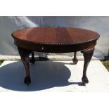 Early 20th century mahogany oval extending table, with gadrooned edge and carved cabriole legs with