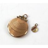 Antique locket pendant, round locket with a textured design, stamped 9 ct front and back,
