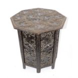 20th century octagonal occasional table, carved with vine leaves, on carved and pierced folding