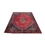 Kashqai style rug, with red field and central medallion, 257 x 173 cm