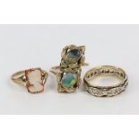 A band ring set with paste stones in 9 ct yellow and white gold, size O, a shell cameo ring, size K,