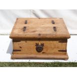 Pine and metal bound chest with twin lid top, and bun feet, H43 W91 D91 cm