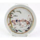 A Chinese Saucer with Children Playing in a Garden. Qing dynasty Painted with young boys playing