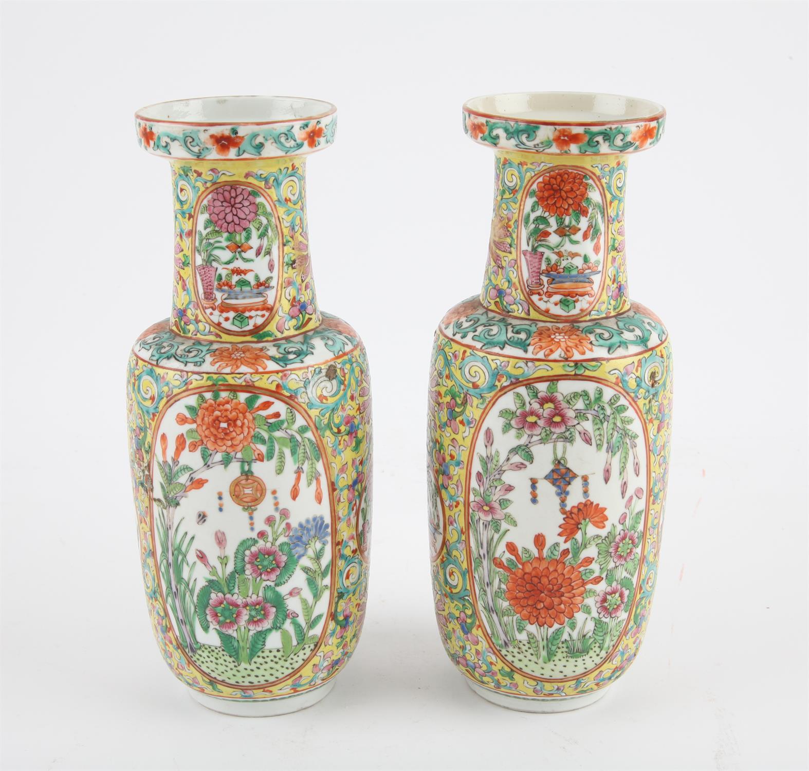 A pair of Chinese yellow ground Famille Rose vases, 19/20th century. Painted with panels with - Image 5 of 10