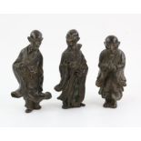 A set of three Chinese Bronze  Daoist immortals . Possibly Late Ming or Early Qing  The standing