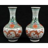 A pair of Chinese Famille Verte, Iron red, Dragon Bottle vases, Qing dynasty, Guangxu period.