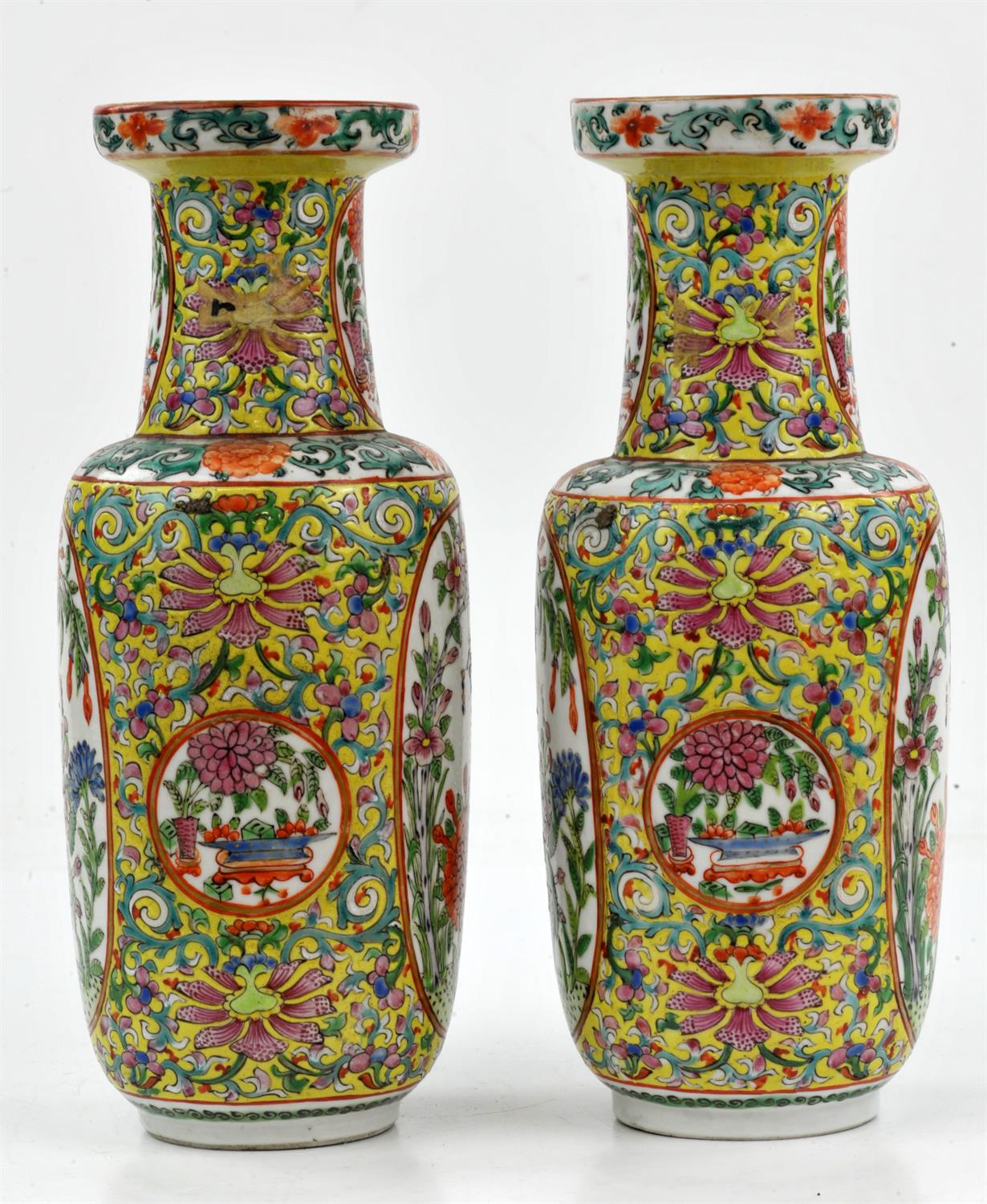 A pair of Chinese yellow ground Famille Rose vases, 19/20th century. Painted with panels with - Image 2 of 10