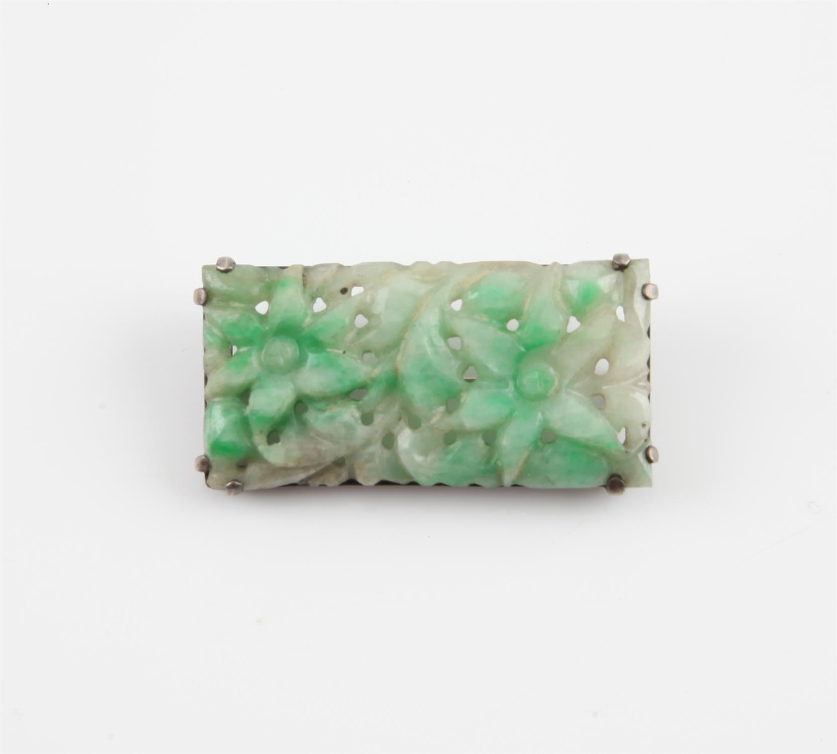Chinese silver and jade brooch, Republic period, c1920. The Jade carved with a floral design. 4.