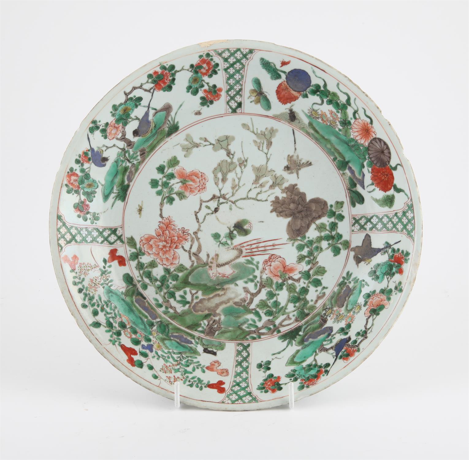 A Chinese Famille Verte Charger. Qing dynasty, Kangxi period the interior enameled with flowers and