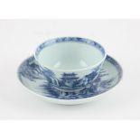 A Chinese Blue and White Tea Bowl and Saucer, Qianlong period, c. 1750. Painted with the typical