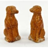 A Chinese Pair of Amber–Glazed pottery figures of Dogs. Tang dynasty (618-907). Both of them