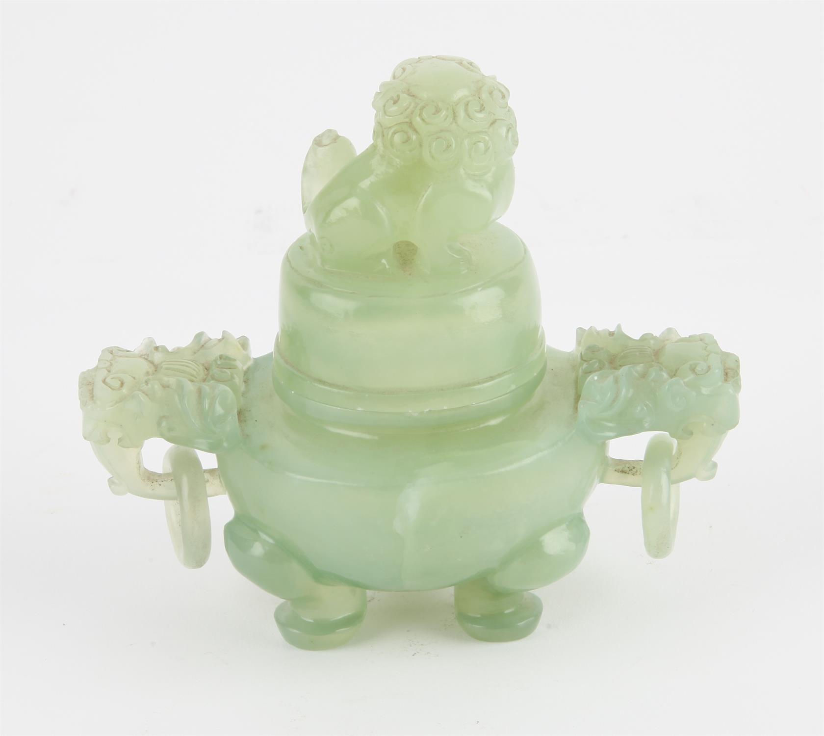 A Chinese Xiu Jade Tripod censer. Decorated with Foo dog finial and Foo dog head handles to sides - Image 2 of 2