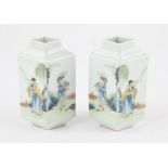 A pair of Chinese lozenge shaped vases, Republic period or later, painted with figures in a garden.