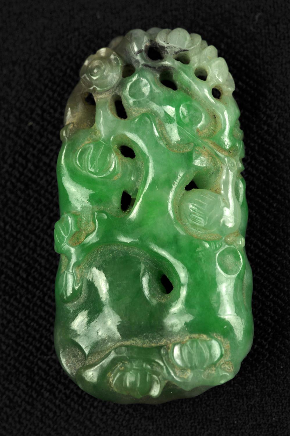 A Jadeite pendant , Qing dynasty or Republic period . Carved with a crane in foliage background . 3. - Image 6 of 8