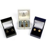 Selection of 9ct gold earrings 6.09g,