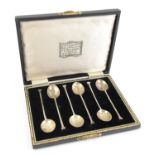 Cased set of six silver seal top spoons, Birmingham, 1925, retailed T W Long of Cardiff & Swansea