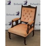 Late Victorian carved walnut armchair, with rosette carved top rail, button back,