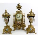 French style gilt metal clock garniture set, with dark blue porcelain panels depicting 18th century
