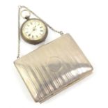 Continental silver fob watch 800 grade with floral dial and a white metal purse